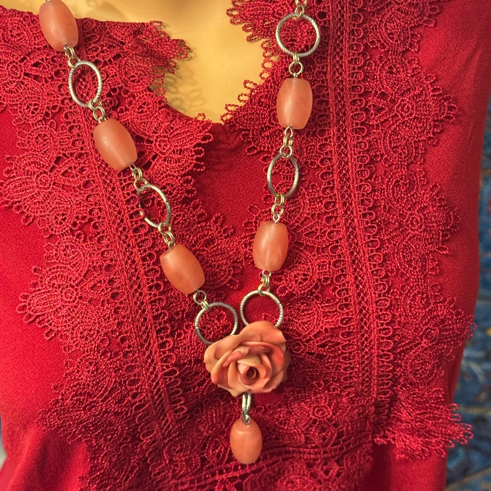 Chunky pink beaded necklace with rose flower pendant